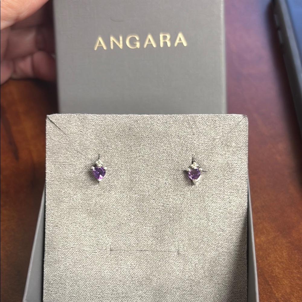 Angara Amethyst studs set in a silver with diamond. Brand new.